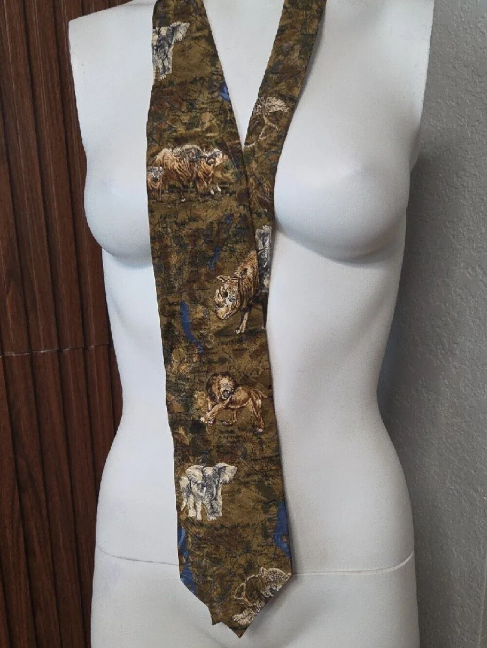 African Big 5 themed silk tie featuring an animal print pattern.